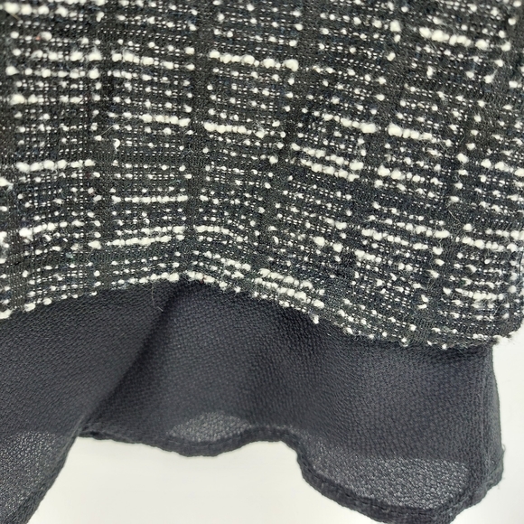 Emelia black and white short sleeve blouse with sheer ruffle bottom - Picture 2 of 5